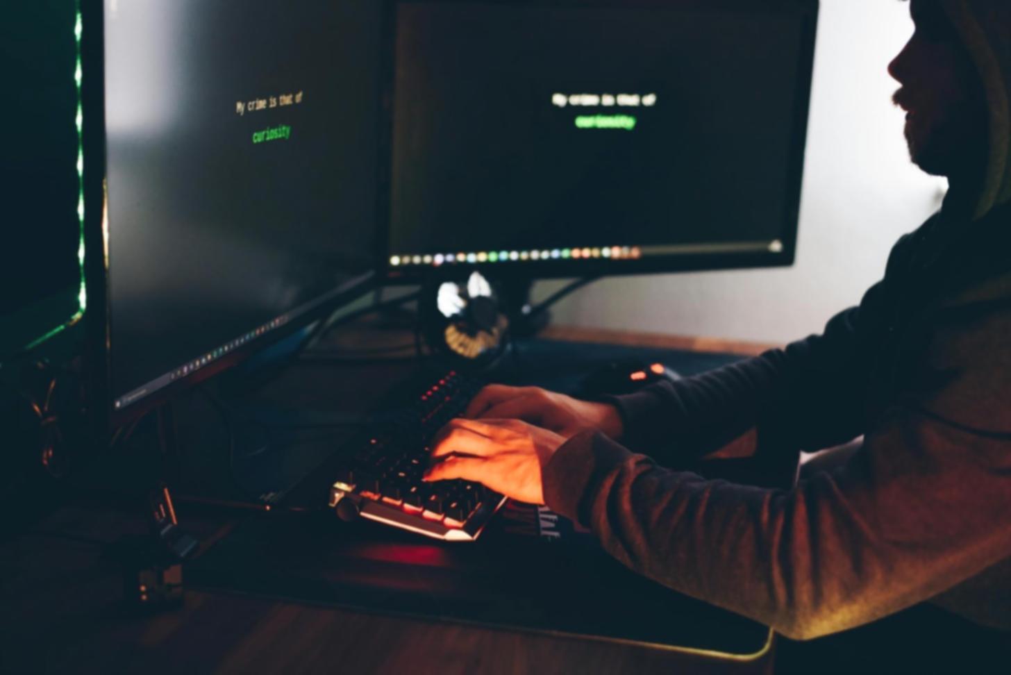 Network operations center monitoring infrastructure security systems in real-time